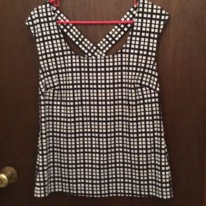 Cap sleeve cross back blouse.